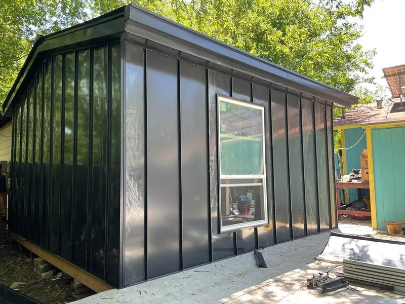 Black standing seam metal wall panels for Metal Roof Installation in Centerville