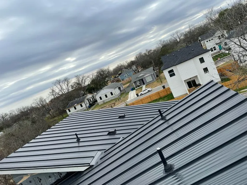 Standing seam metal roof panels with vents for Skylight Repair in Centerville